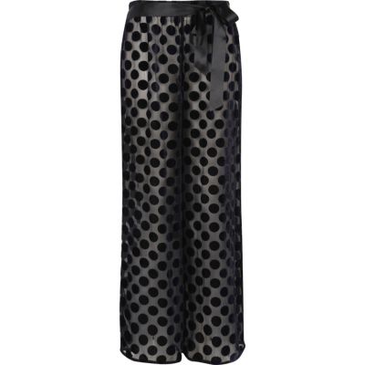 Black devore polka dot trousers