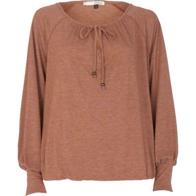 Orange keyhole blouson hem top