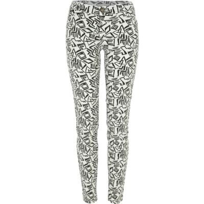 black geometric print super skinny jeans