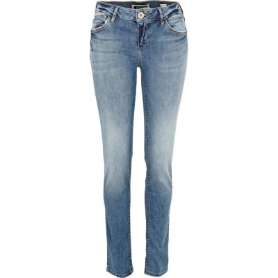 mid wash denim skinny jeans
