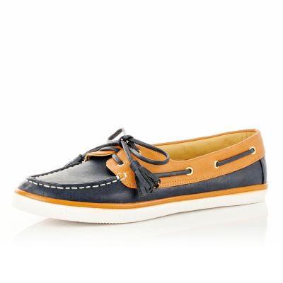 light brown and navy boat shoes