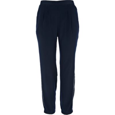 navy tapered trousers