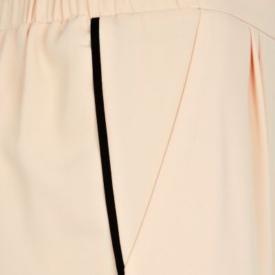 Peach tapered trousers