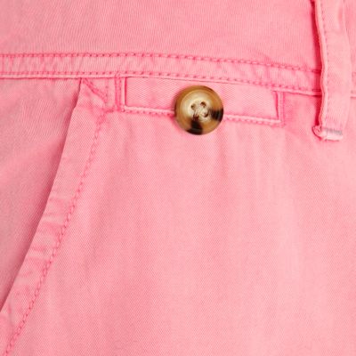 Fluorescent pink chinos
