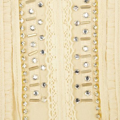 Cream sleeveless tunic top