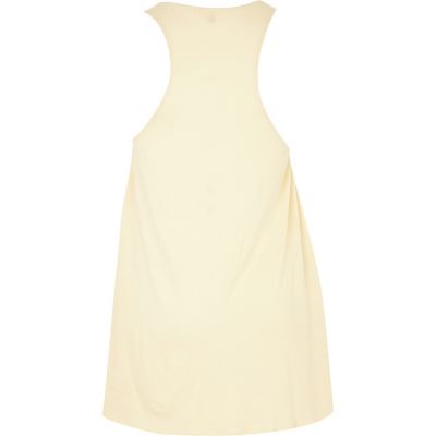 Cream sleeveless tunic top