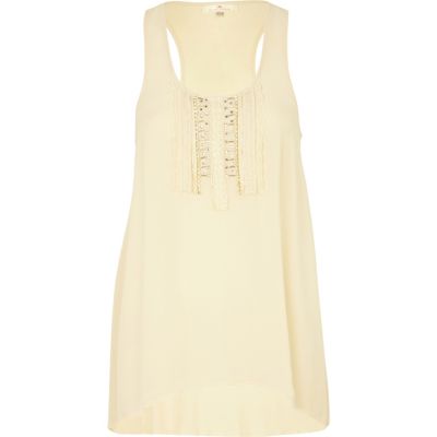 Cream sleeveless tunic top