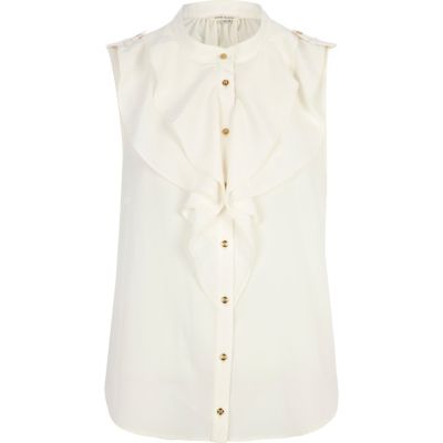 Cream sleeveless frill shirt