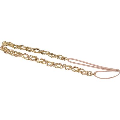 Gold tone twisted diamante headband