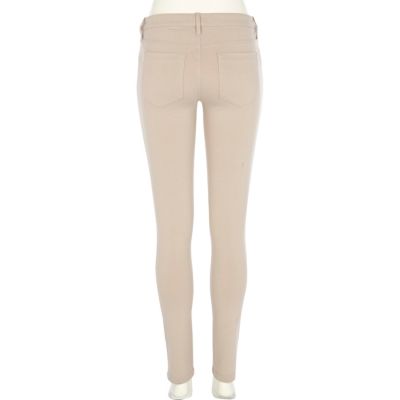 Light beige skinny trousers