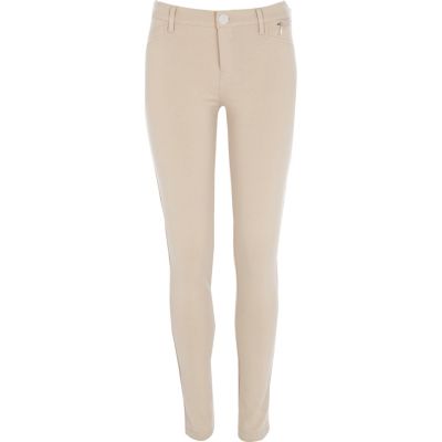 Light beige skinny trousers