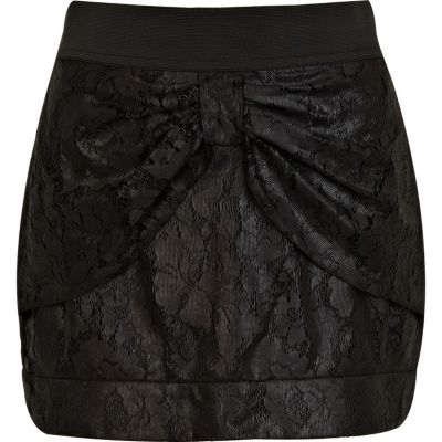 Black coated lace bow mini skirt