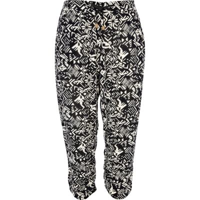Black and white geometric print crop trousers