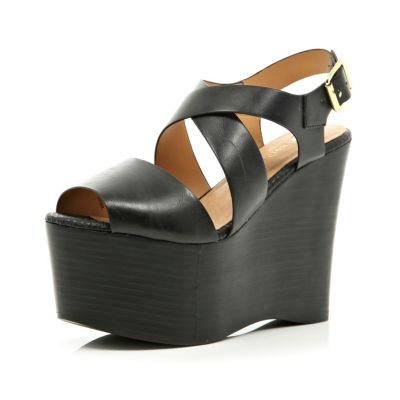 Black strappy open toe extreme flatforms