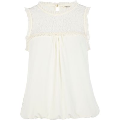 Cream sleeveless lace insert top