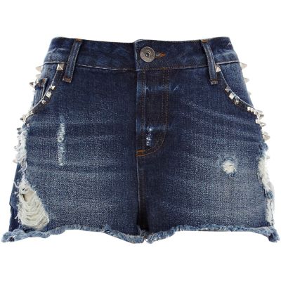 Mid wash distressed studded denim shorts