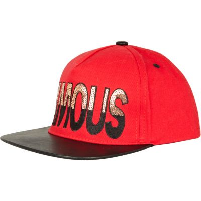 Red leather look peak famous trucker hat