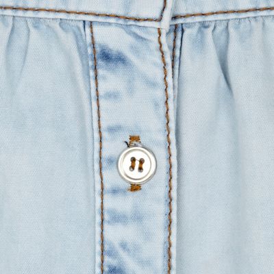Light wash button down mini denim skirt