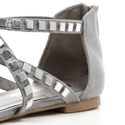 Grey studded metal gladiator sandals