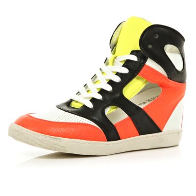 Yellow concealed wedge cut out high tops