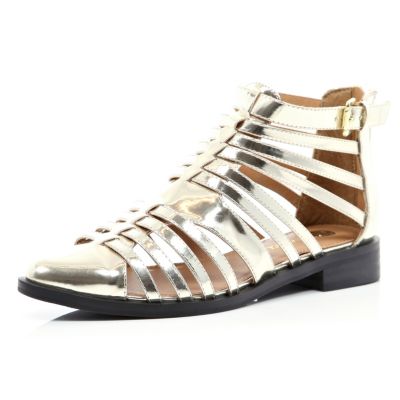 gold gladiator shoes