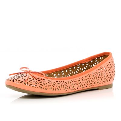 Pink laser cut ballet pumps