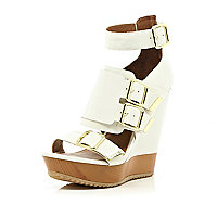 White chunky buckle wedges