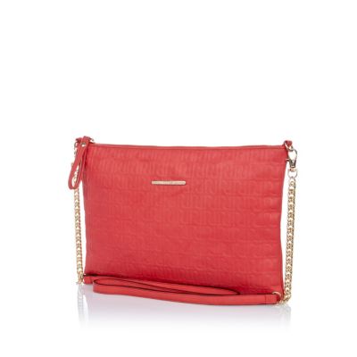 Pink embossed RI logo cross body bag