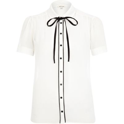 Cream contrast trim bow dolly blouse