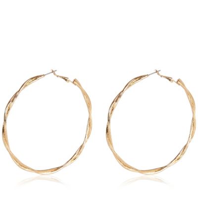 Gold tone twisted hoop earrings