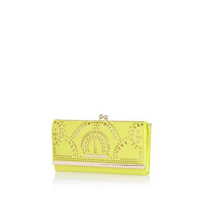 Yellow laser cut clip top purse