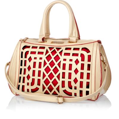 Cream and red laser cut bowler bag 