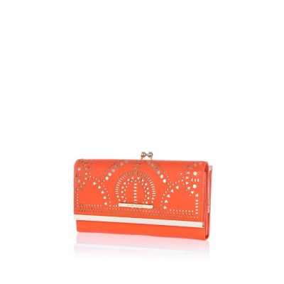 Orange laser cut clip top purse
