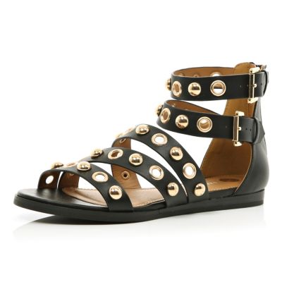 Black studded eyelet gladiator sandals