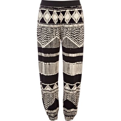 Black and white aztec print jogger trousers