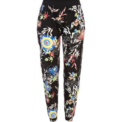 Black oriental print jogger trousers
