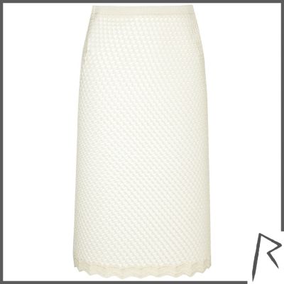 White Rihanna crochet midi skirt