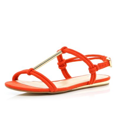 Red metal T bar sandals
