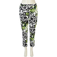 Green floral print cigarette trousers
