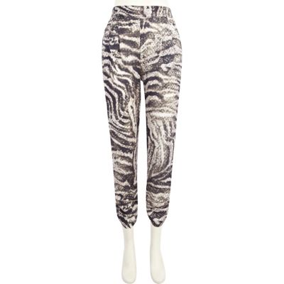 Beige sequin snake print tapered trousers