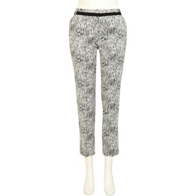 Black and white jacquard print trousers