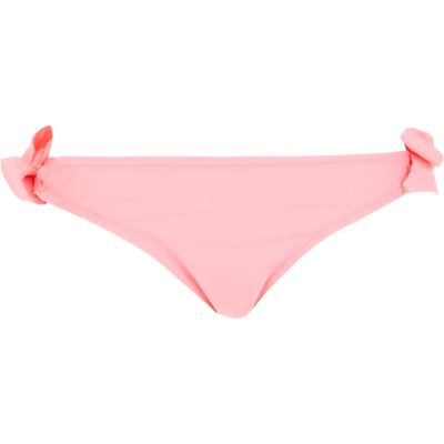 Pink laser cut frill back bikini bottoms