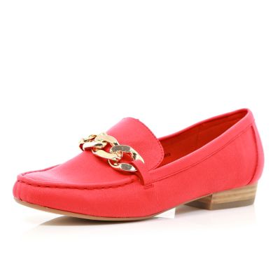 Bright orange chain front loafers