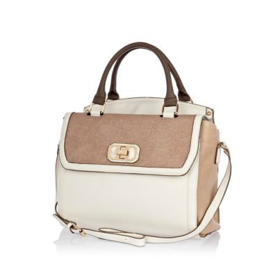 Cream snake panel flap over tote bag