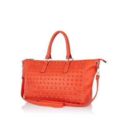 Red stud holdall bag