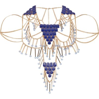 Gold tone gem and spike cape necklace
