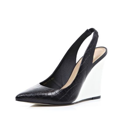 Black and white pointed sling back wedges