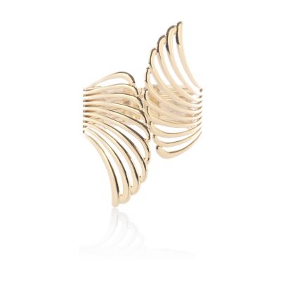 Gold tone metal wing cuff