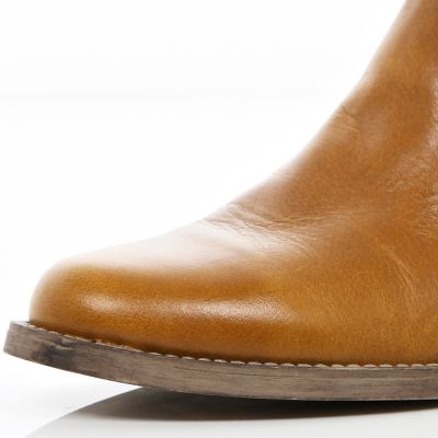 Tan buckle cut out ankle boots