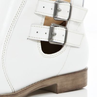 White buckle cut out ankle boots
